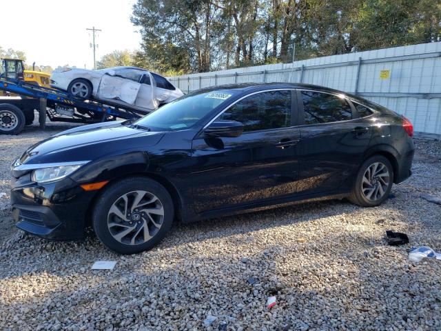 HONDA CIVIC EX 2018 with VIN 19XFC2F70JE012482 - Photo from auction