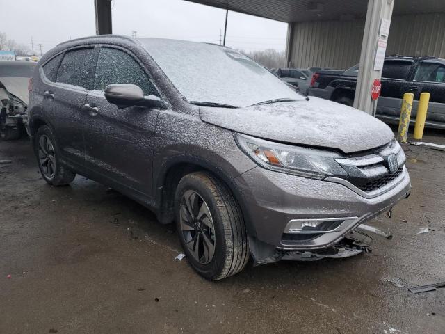Photo 4 from auction – 2015 HONDA CR-V TOURI with VIN 5J6RM4H98FL074015