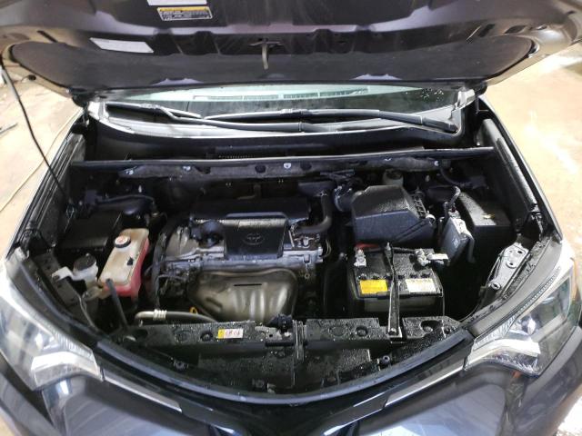 Photo 11 from auction – 2018 TOYOTA RAV4 LE with VIN JTMZFREVXJJ752637