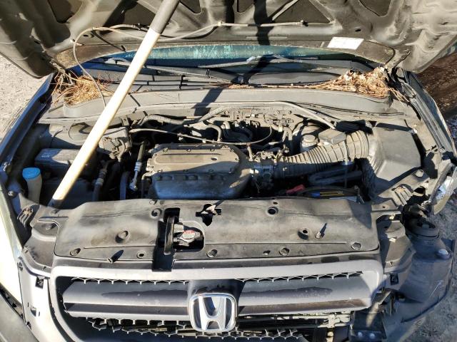 Photo 11 from auction – 2005 HONDA PILOT EXL with VIN 2HKYF18715H510618
