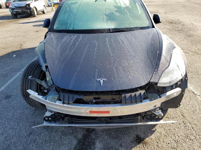 Photo 11 from auction – 2022 TESLA MODEL 3 with VIN 5YJ3E1EA1NF143828
