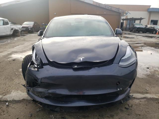 Photo 5 from auction – 2021 TESLA MODEL 3 with VIN 5YJ3E1EB2MF064885