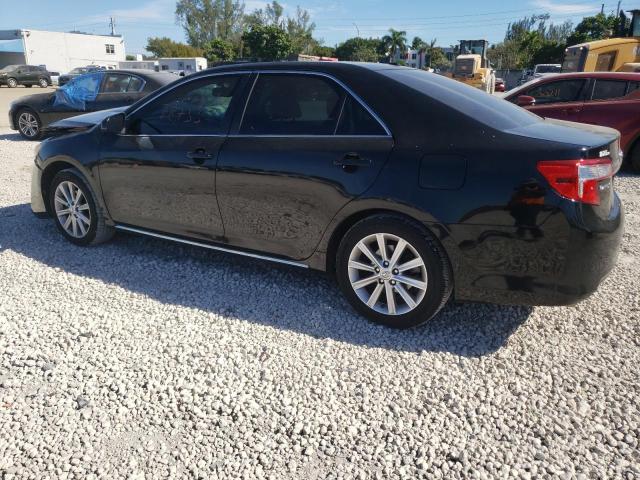 Photo 2 from auction – 2014 TOYOTA CAMRY with VIN 4T1BK1FK2EU026192