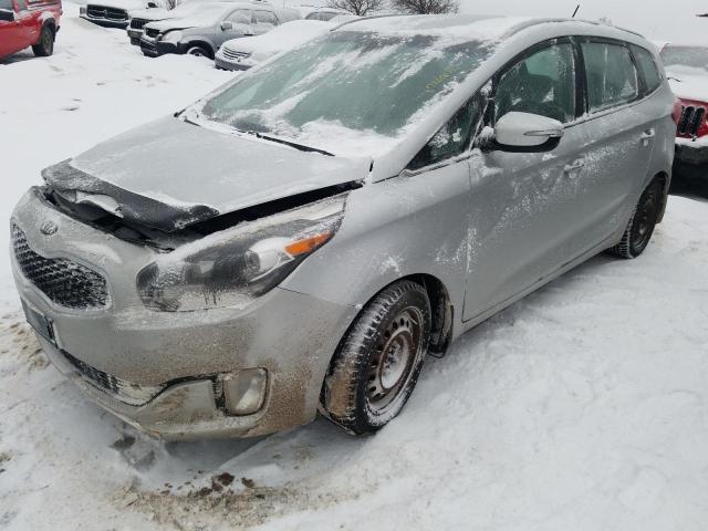KIA RONDO 2014 with VIN KNAHU8A34E7007849 - Photo from auction