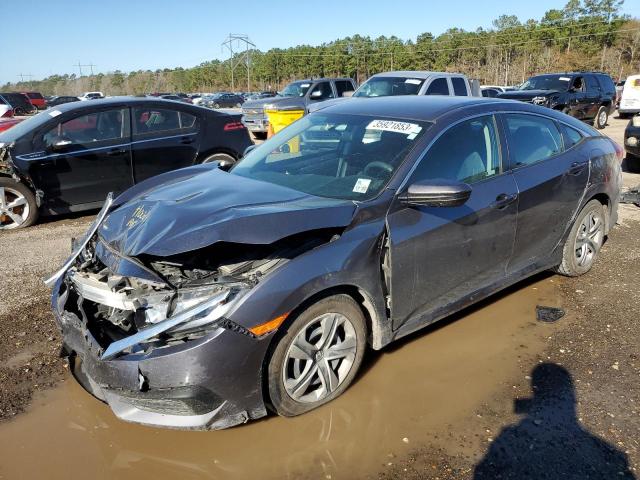 HONDA CIVIC LX 2018 with VIN 2HGFC2F57JH600805 - Photo from auction