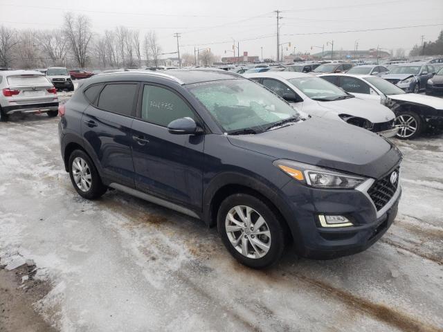 Photo 4 from auction – 2020 HYUNDAI TUCSON LIM with VIN KM8J3CA42LU227567