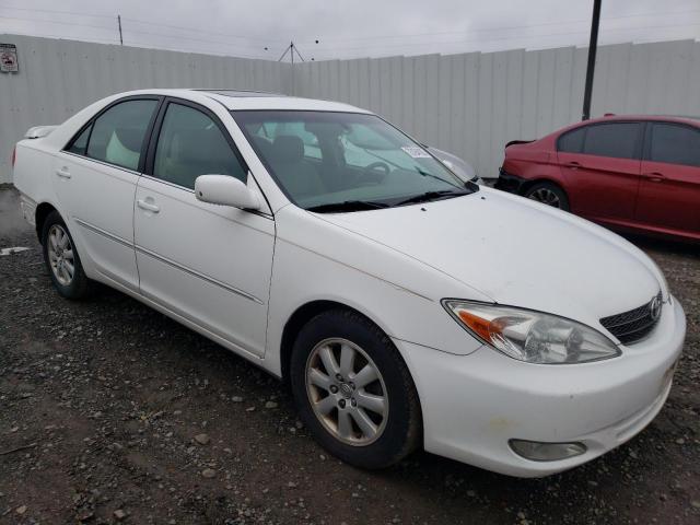 Photo 4 from auction – 2004 TOYOTA CAMRY LE with VIN 4T1BF30K24U077893