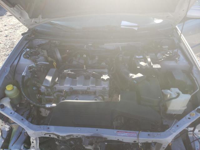 Photo 11 from auction – 2003 MAZDA PROTEGE DX with VIN JM1BJ225530119323
