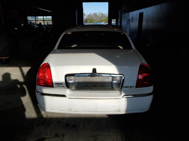 Photo 6 from auction – 2003 LINCOLN TOWN CAR E with VIN 1LNHM81W83Y684449