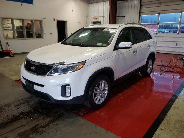 KIA SORENTO LX 2014 with VIN 5XYKTCA61EG549941 - Photo from auction