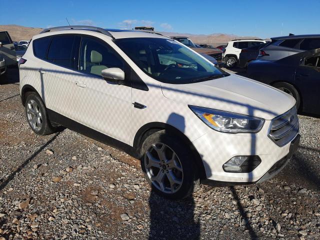 Photo 4 from auction – 2018 FORD ESCAPE TIT with VIN 1FMCU9J93JUB86464