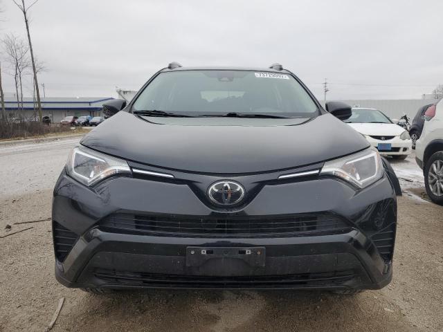 Photo 5 from auction – 2017 TOYOTA RAV4 LE with VIN 2T3BFREV7HW584324