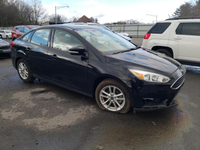 Photo 4 from auction – 2016 FORD FOCUS SE with VIN 1FADP3F24GL323537