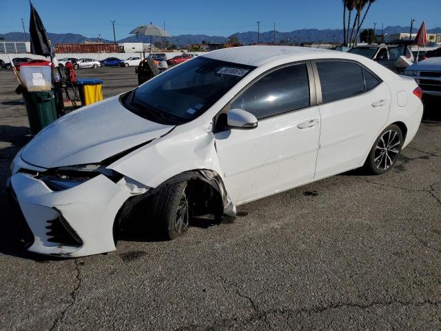 TOYOTA COROLLA L 2018 with VIN 2T1BURHE3JC017447 - Photo from auction