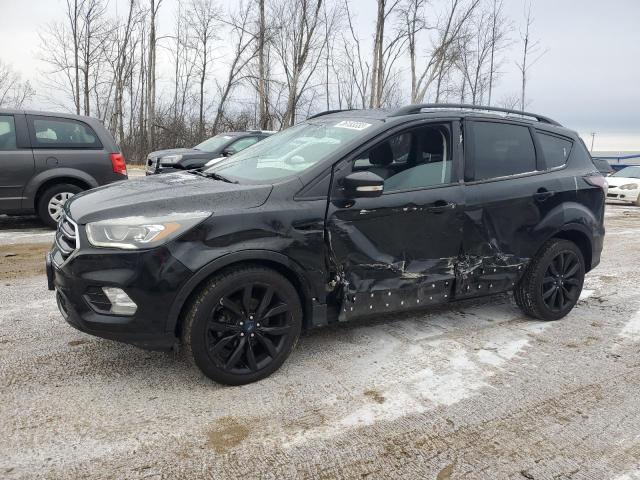 FORD ESCAPE TIT 2017 with VIN 1FMCU0JD7HUA47237 - Photo from auction