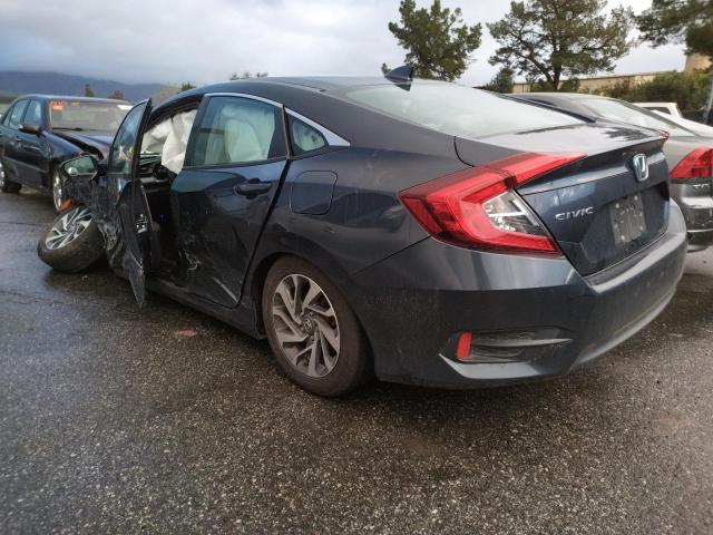 Photo 2 from auction – 2018 HONDA CIVIC EX with VIN 19XFC2F70JE208793