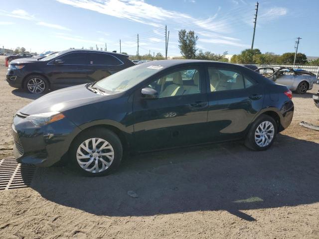 TOYOTA COROLLA L 2018 with VIN 5YFBURHE2JP817110 - Photo from auction