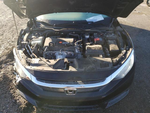 Photo 11 from auction – 2018 HONDA CIVIC LX with VIN 19XFC2F52JE011915