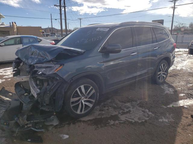 HONDA PILOT TOUR 2017 with VIN 5FNYF6H97HB042556 - Photo from auction