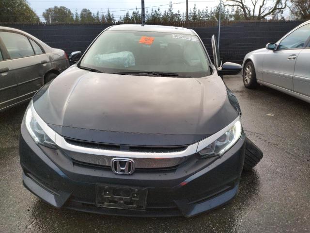 Photo 5 from auction – 2018 HONDA CIVIC EX with VIN 19XFC2F70JE208793