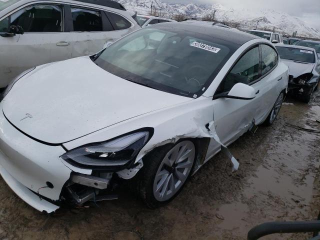 TESLA MODEL 3 2022 with VIN 5YJ3E1EAXNF371388 - Photo from auction