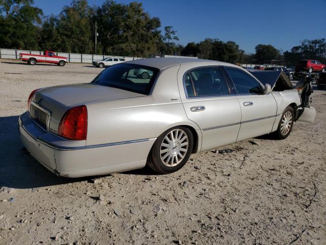 Photo 3 from auction – 2004 LINCOLN TOWN CAR U with VIN 1LNHM83W84Y664748