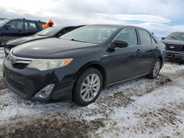 TOYOTA CAMRY HYBR 2013 with VIN 4T1BD1FK6DU073718 - Photo from auction