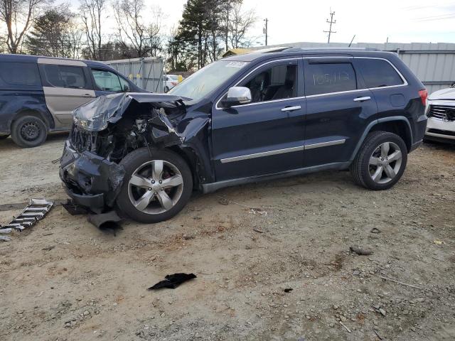 JEEP GRAND CHER 2011 with VIN 1J4RR6GT7BC700884 - Photo from auction