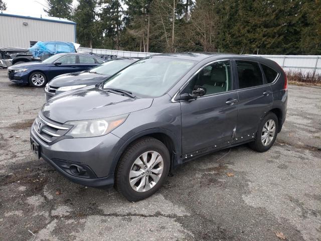 HONDA CR-V EX 2013 with VIN 3CZRM3H53DG702919 - Photo from auction