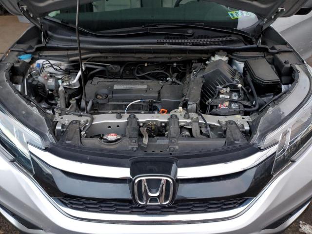 Photo 11 from auction – 2015 HONDA CR-V LX with VIN 5J6RM4H39FL035400
