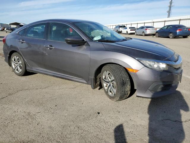 Photo 4 from auction – 2017 HONDA CIVIC LX with VIN 2HGFC2F57HH512511