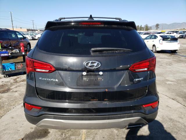 Photo 6 from auction – 2018 HYUNDAI SANTA FE S with VIN 5NMZU3LB1JH058100