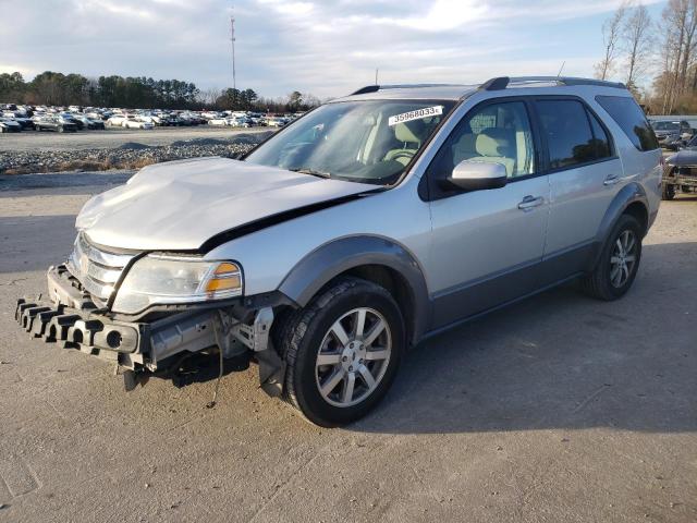 FORD TAURUS X S 2009 with VIN 1FMDK02W29GA02460 - Photo from auction
