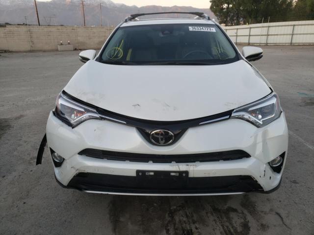 Photo 5 from auction – 2018 TOYOTA RAV4 LIMIT with VIN JTMDFREV3JD248682