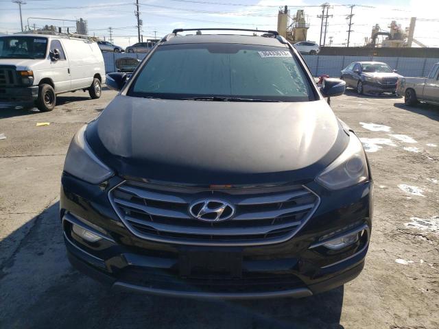 Photo 5 from auction – 2018 HYUNDAI SANTA FE S with VIN 5NMZU3LB1JH058100
