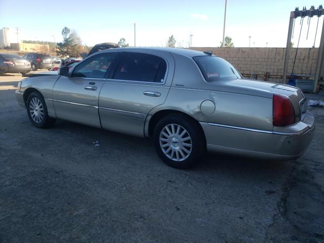 Photo 2 from auction – 2004 LINCOLN TOWN CAR E with VIN 1LNHM81W64Y623666