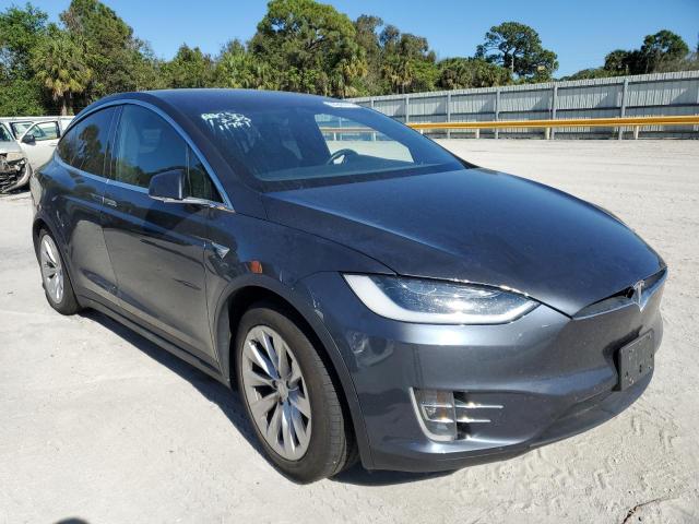 Photo 4 from auction – 2017 TESLA MODEL X with VIN 5YJXCAE28HF077704