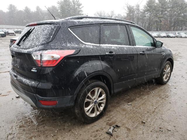 Photo 3 from auction – 2017 FORD ESCAPE SE with VIN 1FMCU9GD7HUD47677