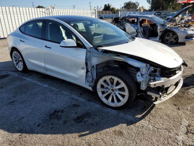 Photo 4 from auction – 2022 TESLA MODEL 3 with VIN 5YJ3E1EB6NF144823