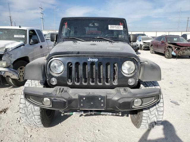 Photo 5 from auction – 2014 JEEP WRANGLER U with VIN 1C4BJWDG0EL130396