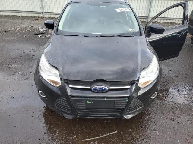 Photo 11 from auction – 2012 FORD FOCUS SE with VIN 1FAHP3K24CL123212