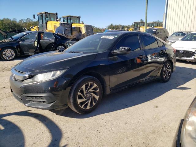 Photo 1 from auction – 2018 HONDA CIVIC EX with VIN 19XFC2F72JE006411