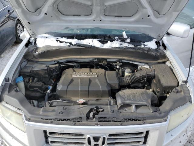 Photo 11 from auction – 2006 HONDA RIDGELINE with VIN 2HJYK16486H554139
