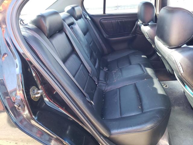 Photo 10 from auction – 2000 INFINITI G20 with VIN JNKCP11A8YT300660