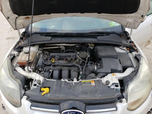 Photo 11 from auction – 2012 FORD FOCUS TITA with VIN 1FAHP3J25CL463003