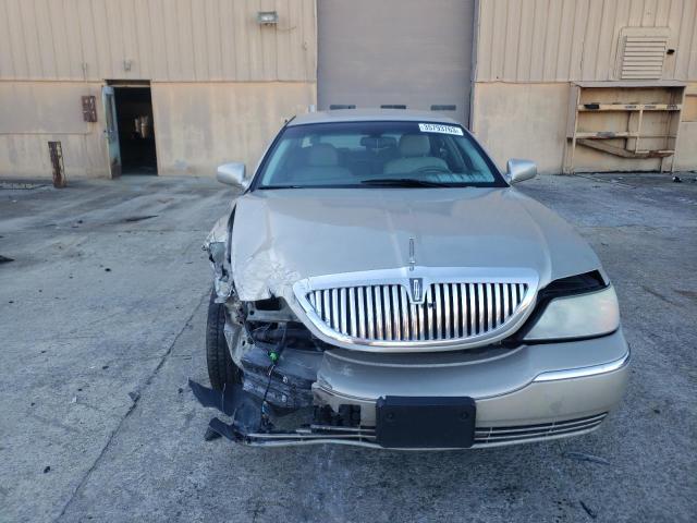 Photo 5 from auction – 2004 LINCOLN TOWN CAR E with VIN 1LNHM81W64Y623666