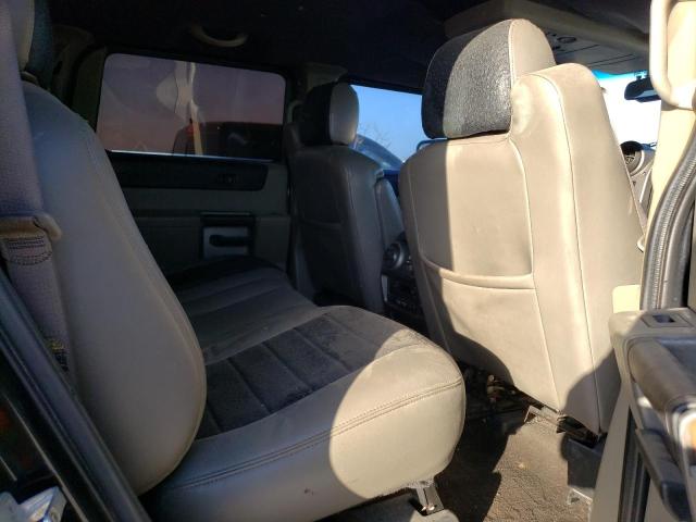 Photo 11 from auction – 2003 HUMMER H2 with VIN 5GRGN23U33H147394