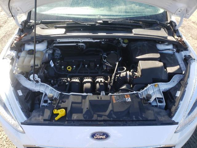 Photo 11 from auction – 2015 FORD FOCUS S with VIN 1FADP3E22FL358044