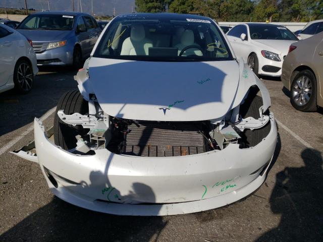 Photo 5 from auction – 2022 TESLA MODEL 3 with VIN 5YJ3E1EB5NF195682