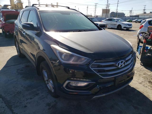 Photo 4 from auction – 2018 HYUNDAI SANTA FE S with VIN 5NMZU3LB1JH058100